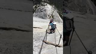 Going down the cables on Half Dome at Yosemite National Park, CA