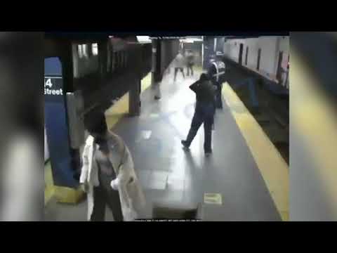Terrifying moment woman, 40, is shoved onto subway tracks and run over by a train in an 'unprovoked'