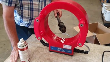 Magnetic Particle Inspection of Metal Rod by Russell Fraser