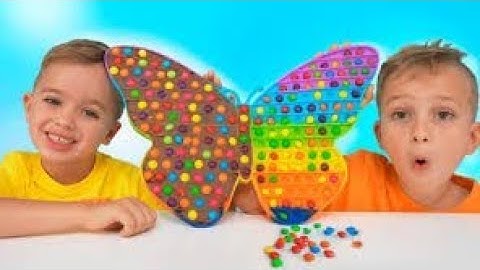 Vlad and Niki Chocolate Pop it Challenge .. Tippy toe game toy