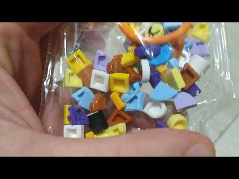Розпакування Конструктора LEGO DOTS Брелок для сумочки «Леопард» 84 деталі (41929) з Rozetka Розпакування Конструктора LEGO DOTS Брелок для сумочки «Леопард» 84 деталі (41929) з Rozetka