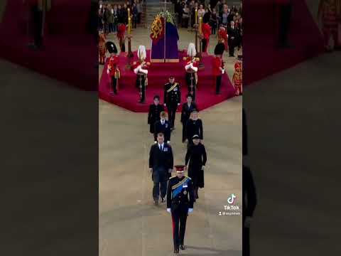 Queen's grandchildren hold vigil around coffin