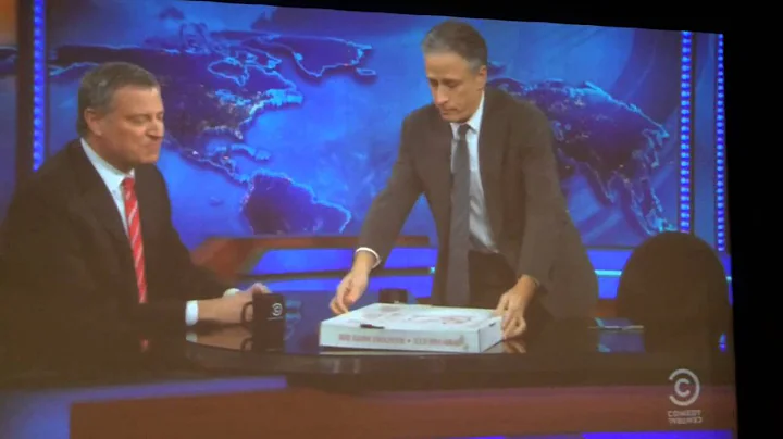 Jon Stewart Brings out John's Pizza on Air!