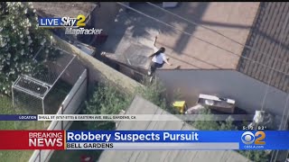 Pursuit Suspect Climbs On Roof Of Home, Leaps To Neighboring Roof