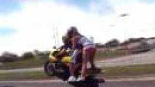 wheelie on motorcycle- tandem stunt