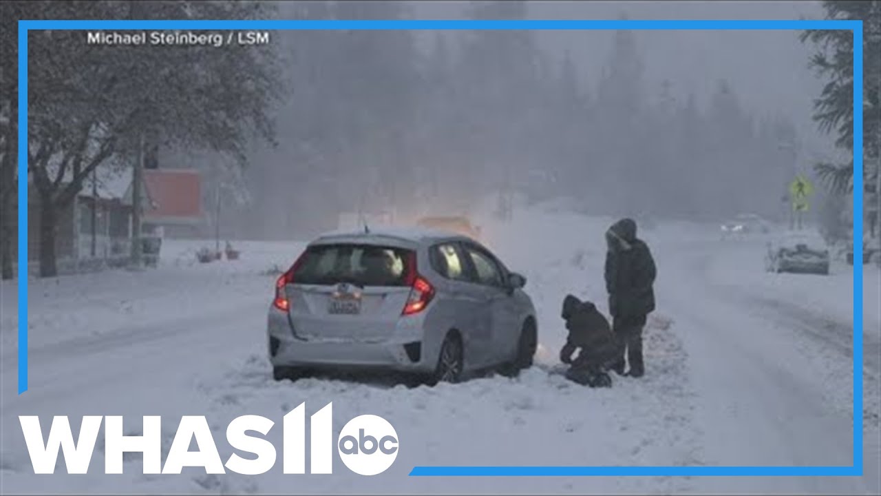 Snow and rain fall across both sides of the United States - YouTube