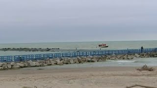 Search resume for teen swept into Lake Michigan
