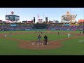 Taylor Walls makes the throw for the out at home vs the Los Angeles Dodgers