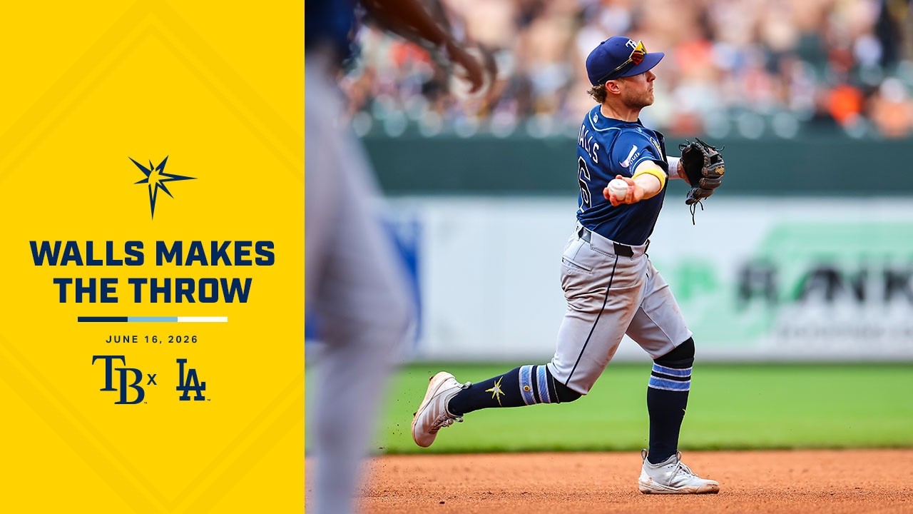 Taylor Walls makes the throw for the out at home vs the Los Angeles Dodgers