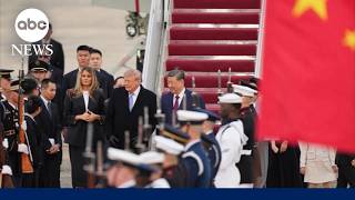 Trump greets China's President Xi Jinping for high-stakes summit