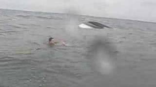 Coast Guard rescues 3 from capsized boat off New Jersey