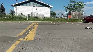 Traxxas Rustler jump a speed bump in slow motion