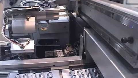 DENSO Robotics - Internally installed robot tends CNC machine