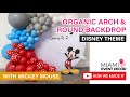 Mickey Mouse Birthday Party | Round backdrop and balloon garlands on the ceiling