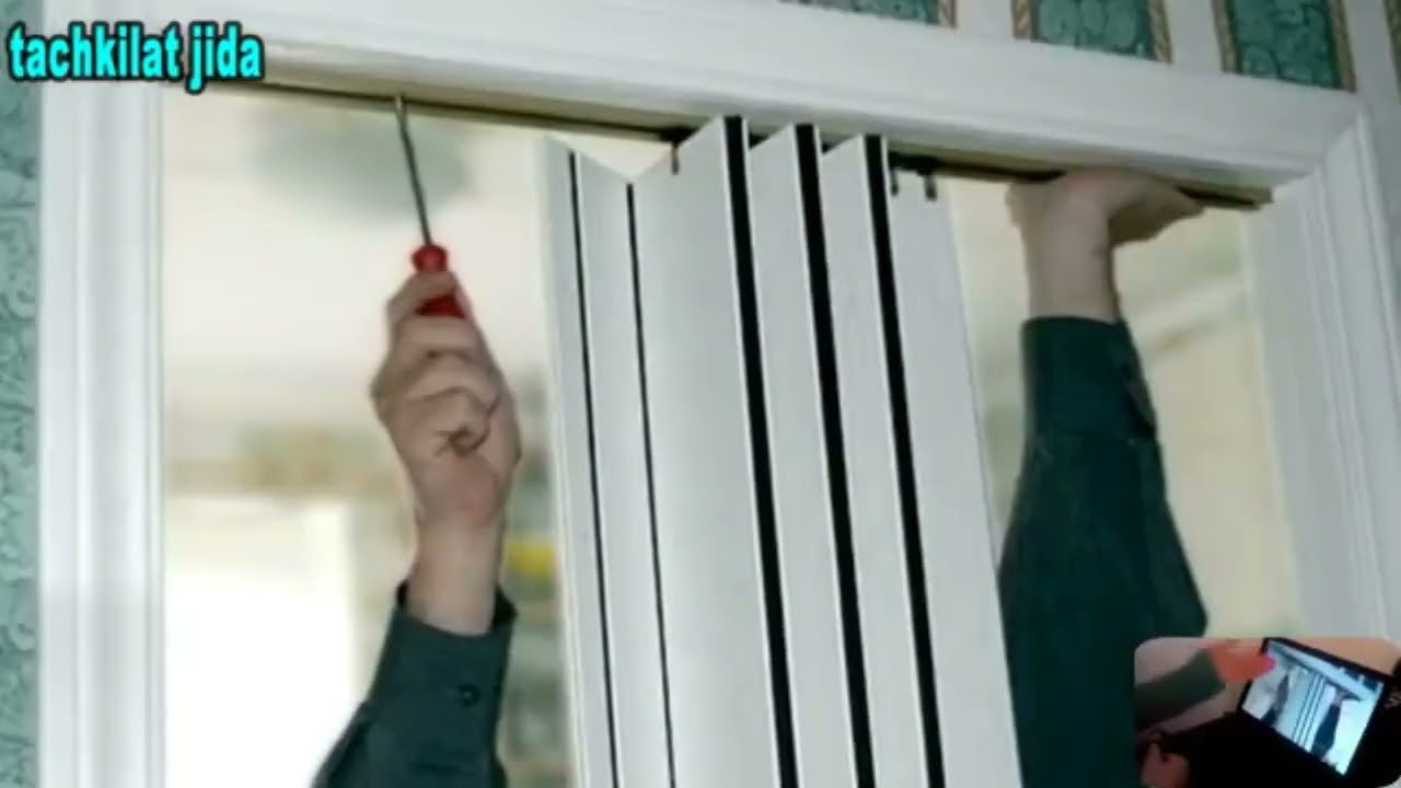 باب اكورديون لي عطاتني مساحة وجمالية في مطبخي الصغير