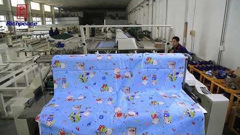 Flat Open Fabric Spreading Process by  Automatic Spreading Machine