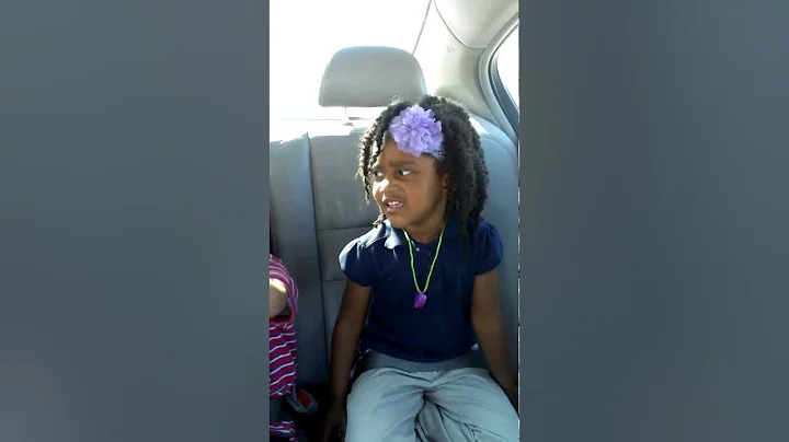 Jada singing in the back seat with her sister and ...