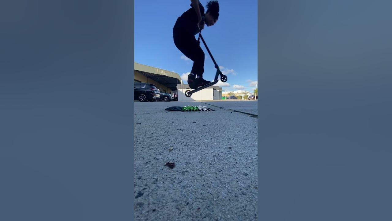 how-many-bottles-can-you-jump-likeandsubscribe-scooter-jumping
