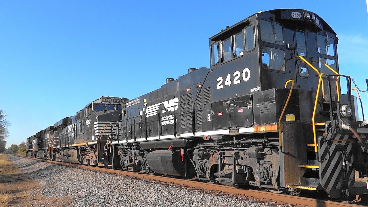 Norfolk Southern mixed manifest freight train 13R heads south out of Vardo ...