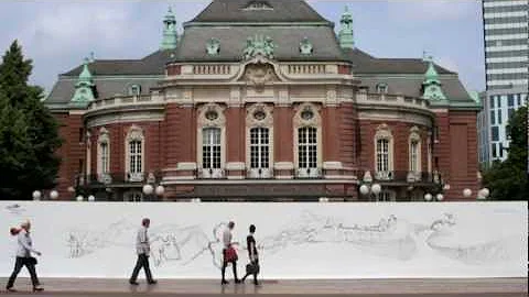 Debbie Smyth installing artwork for Hamburg Philha...