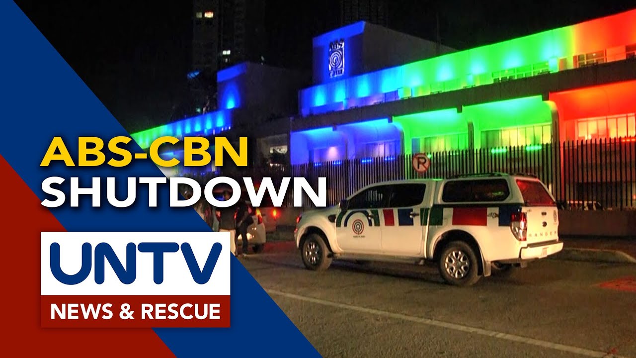 Candles lit in front of ABS-CBN compound; Employees express sadness