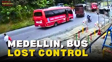 BUS PLUNGES INTO RAVINE IN RURAL MEDELLIN, COLUMBIA CAUGHT ON SECURITY CAMERA