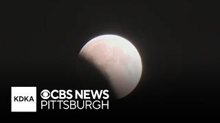 Near-total lunar eclipse puts red moon in sky above Pittsburgh