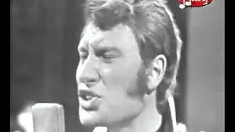 Johnny Hallyday cheveux long et idées courtes