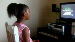 Trenice A, Singing karaoke to Michael Jackson "Earth Song"