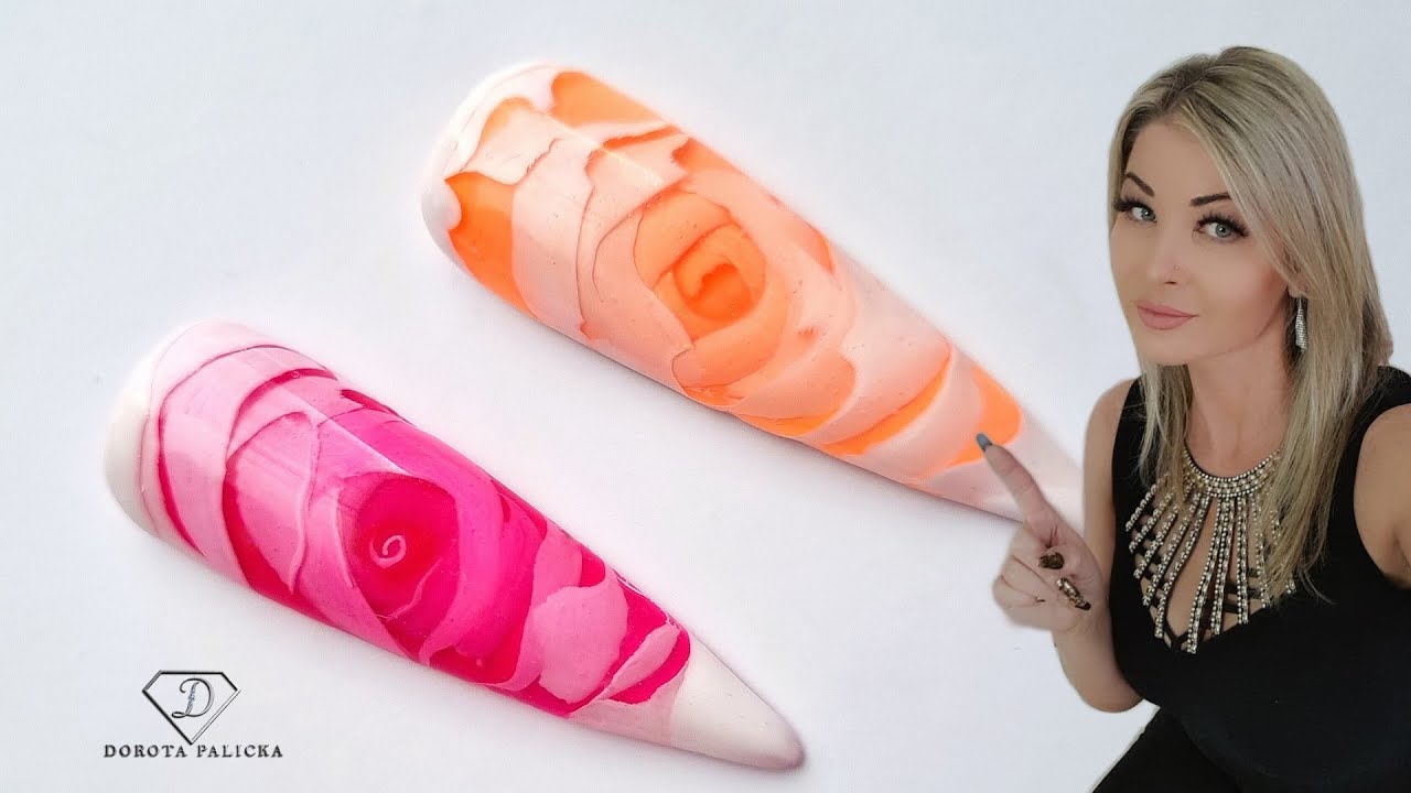 3D rose nail art. 3D rose nail trend with buldier gel and gel polish.