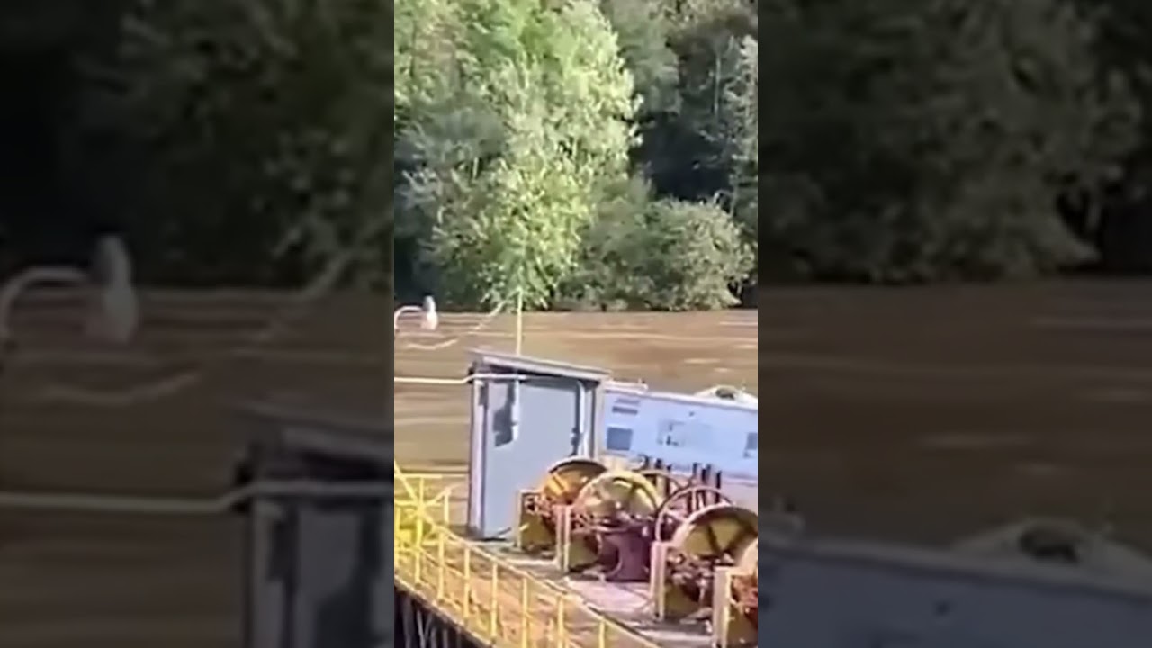 Floodwaters wash away RV over waterfall! 