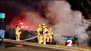 Tractor-trailer crashes into creek