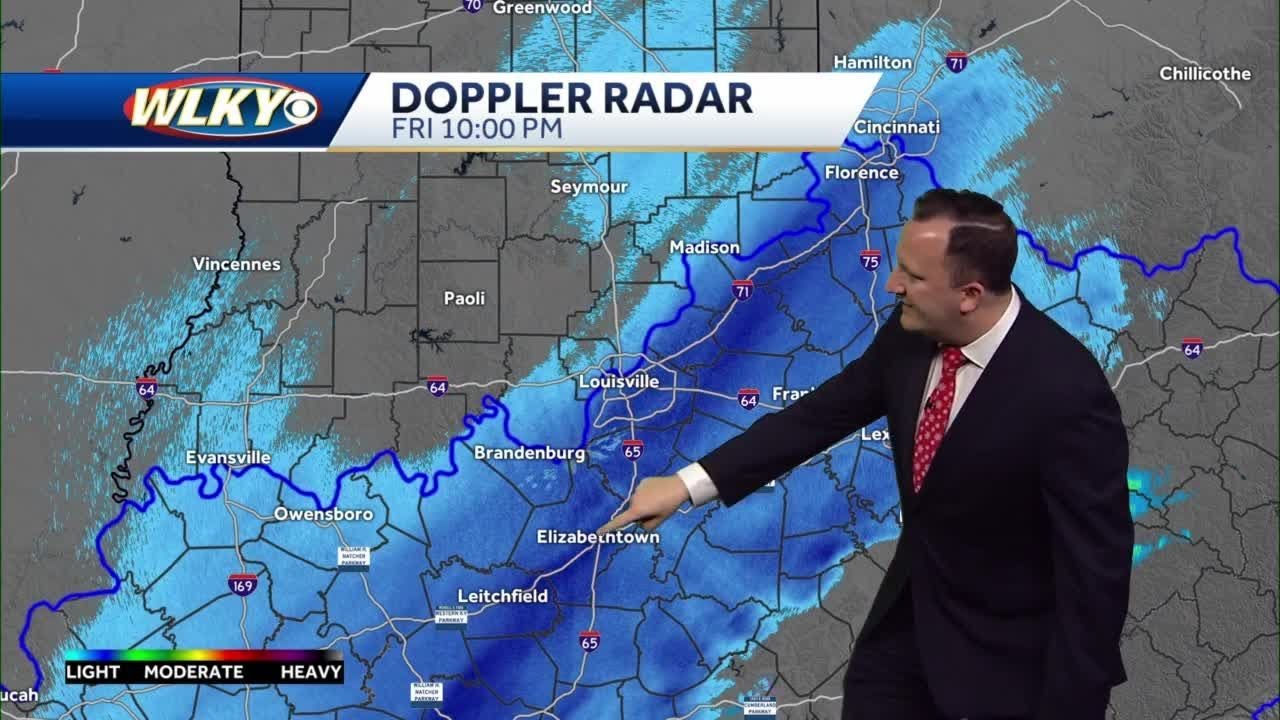 Snow tapers off and the cold settles in - YouTube