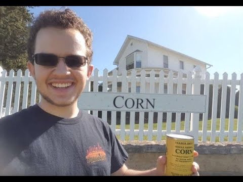 Woey holding corn