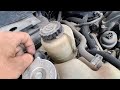 Where Is the Power Steering Fluid Reservoir in a Dodge Journey (2009-2020)?