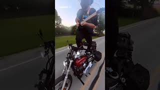 A funny biker playing guitar on his motorcycle @PianoSheetMusic