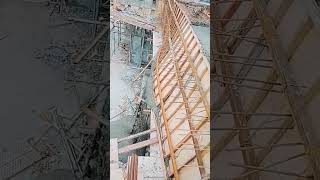 The process of pouring concrete into the formwork of a column- tools and machines make work easier