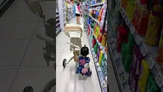 When toddler struggles to push the bike stroller—just like us! Online fail #parentinglessons