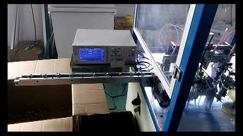 Automatic EE core taping & testing machine WM-1948TSN. newwinhk@hotmail.com