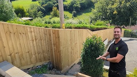 Installing a HUGE Fence On A TRICKY Slope