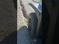 Hawk Yak 4WD wheel traction test through a rut on a steep gravel hill.