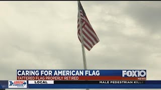 Retiring tattered American flags