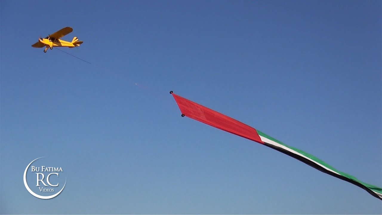 rc plane with long uae flag jamal al mazrouei علم دولة الامارات