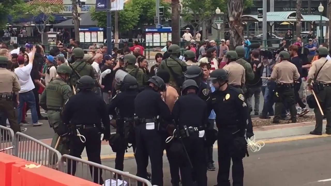 Riot police arrest protester in San Diego - YouTube