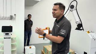 Explanation and simulation of robotic arm applications in warehouse operations.