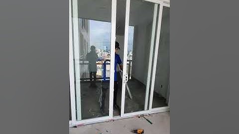 Cửa lùa 4 cánh hệ 55 nhôm xingfa + kính ghép