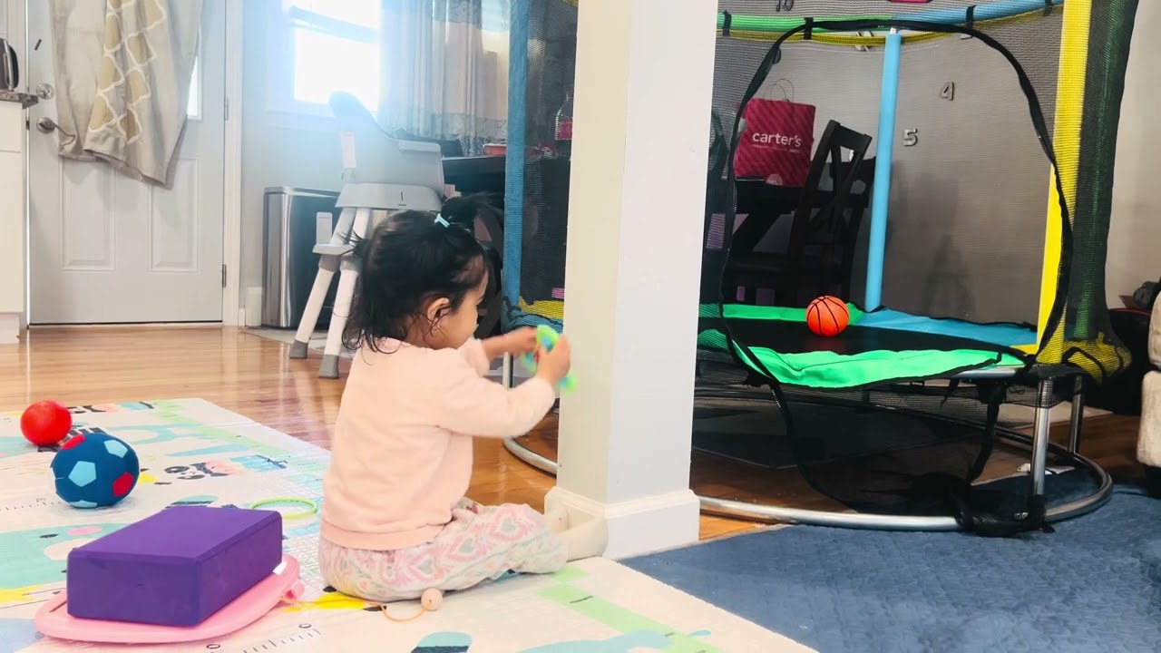 Raising kid in USA: Playing with Spinning Toy. 
