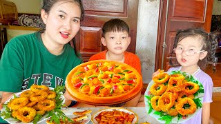 Cam Cam nhờ đầu bếp changcady giúp đỡ trổ tài làm món pizza, bánh donut gà rán, bánh Topokki.