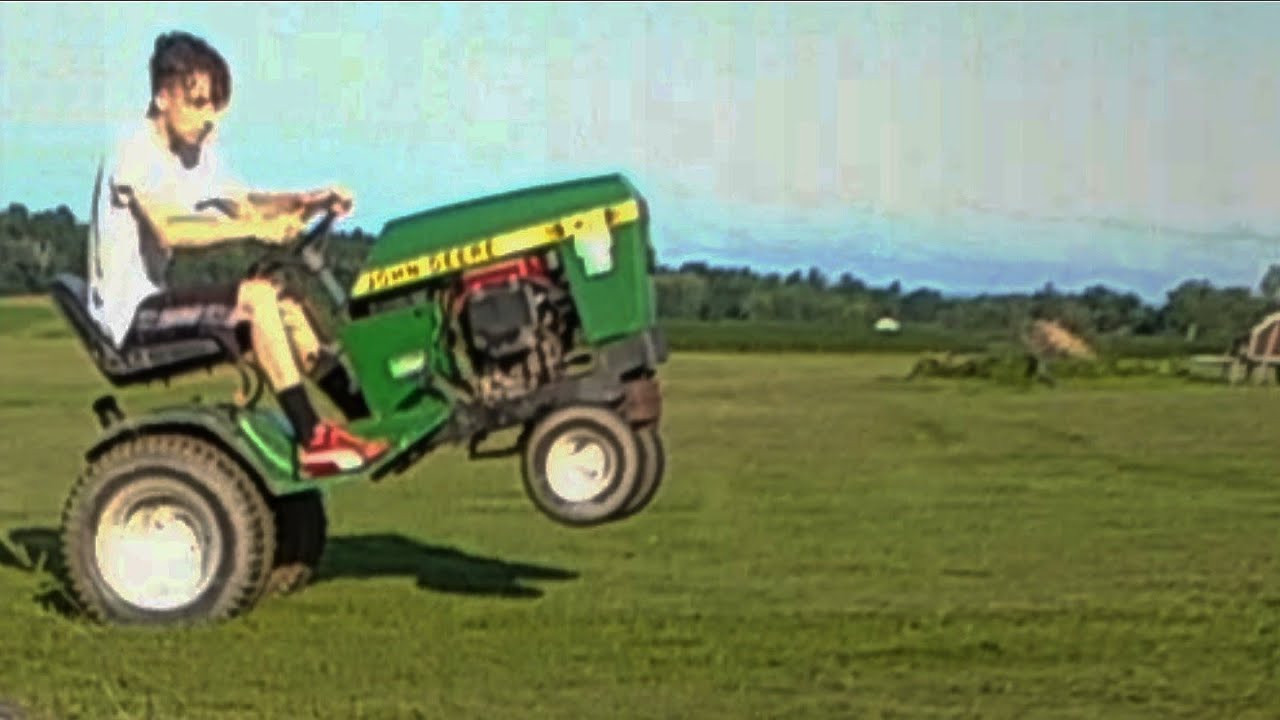 DOING WHEELIES ON 18HP JOHN DEERE! YouTube