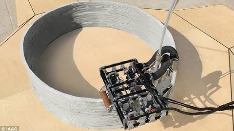 No job is too big for these tiny robots! Clip-on machines 3D print BUILDINGS like giant coil pots